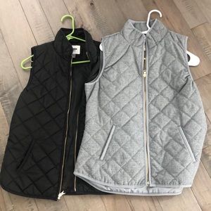 A pair of Old Navy Vests